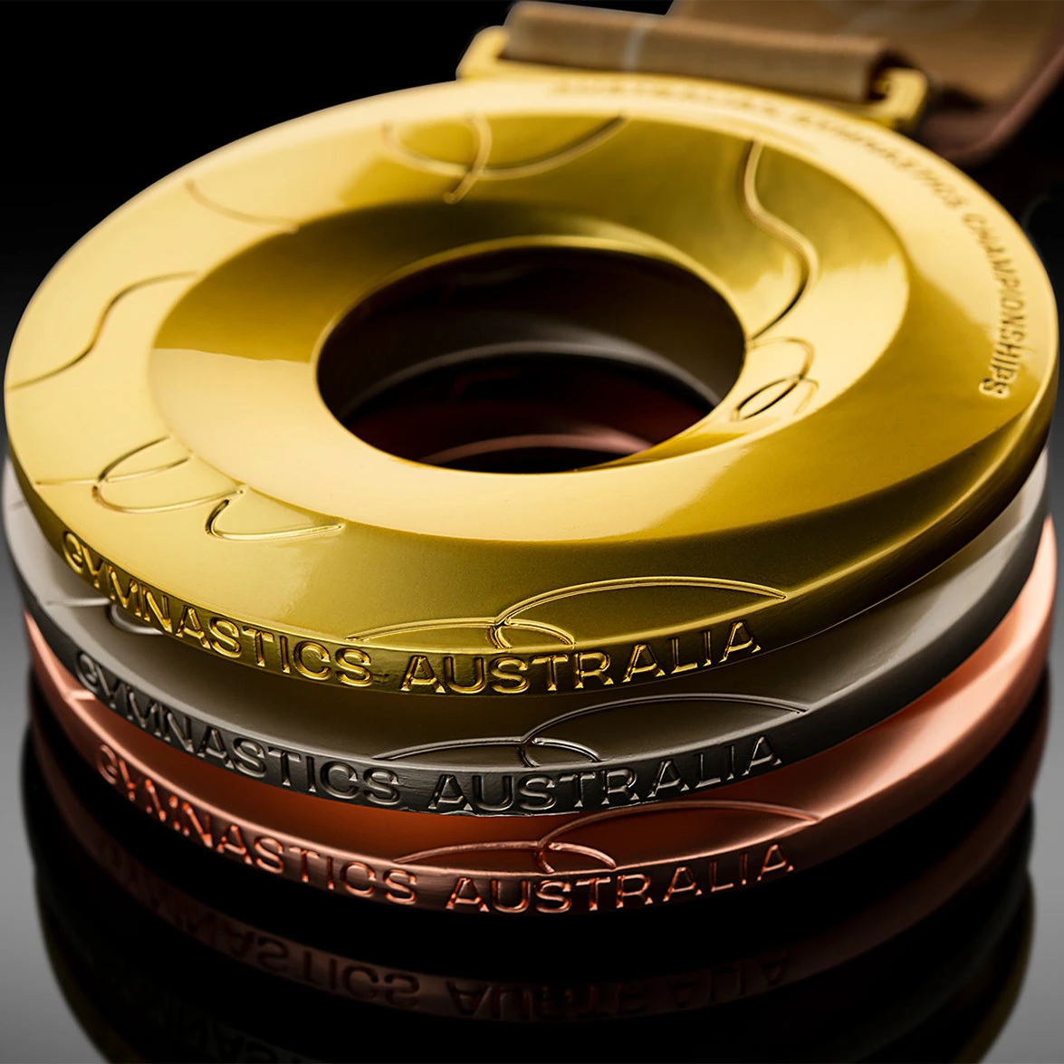 Stack of gold, silver and bronze medals